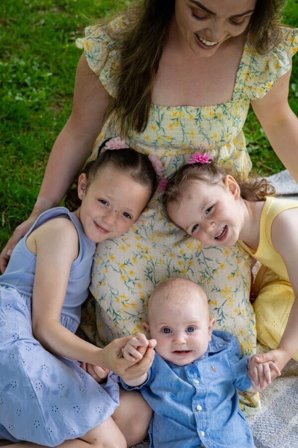 A mother and her children in summer colours