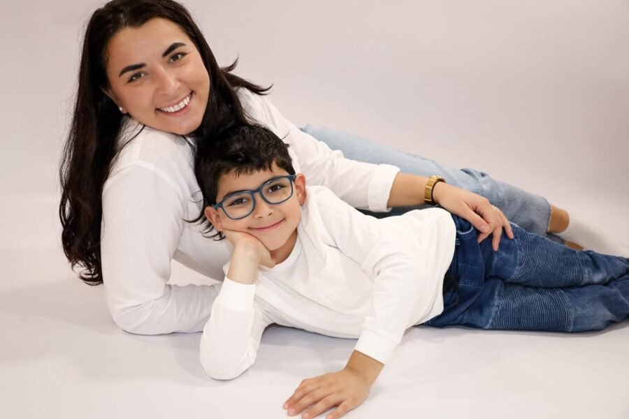 A mother and son lying together in the studio
