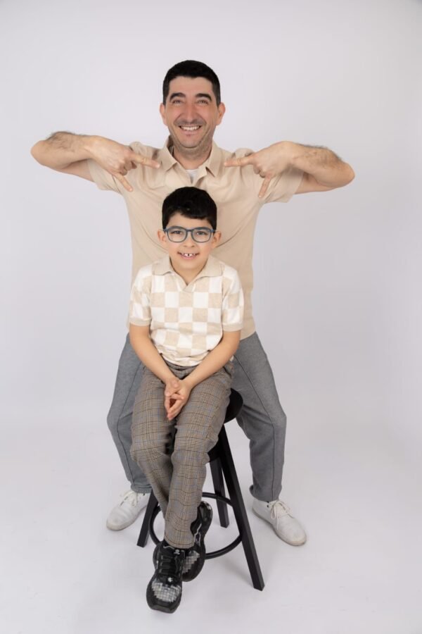 A father and son together in the studio