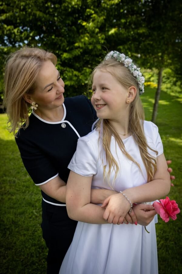 A mother with her daughter in the park