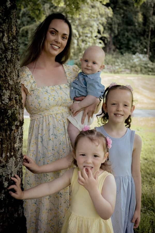 A mother with her children dressed in summer yellows