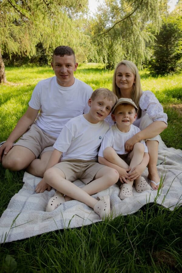 A family together outdoors on a summer day