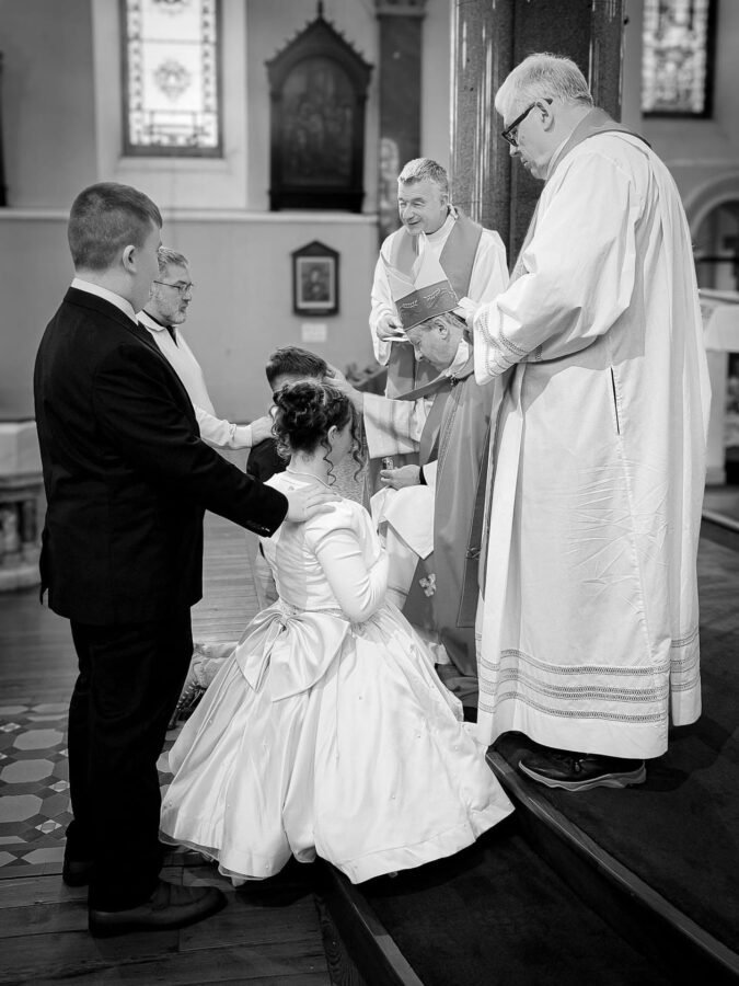 A christening photographed in black and white