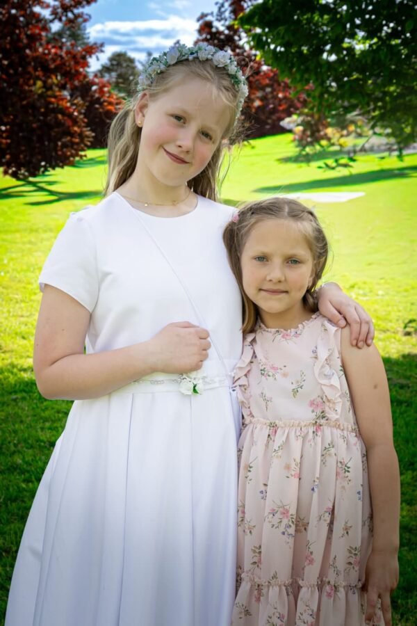Two girls in their Communion dresses
