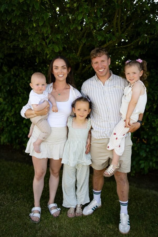 A family with young children outdoors