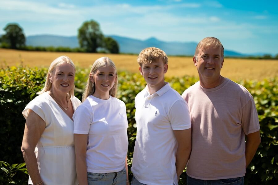 A family together in a field